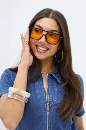 rosie zonnebril oranje trendy statement dames bril merk see you ladylike fashion