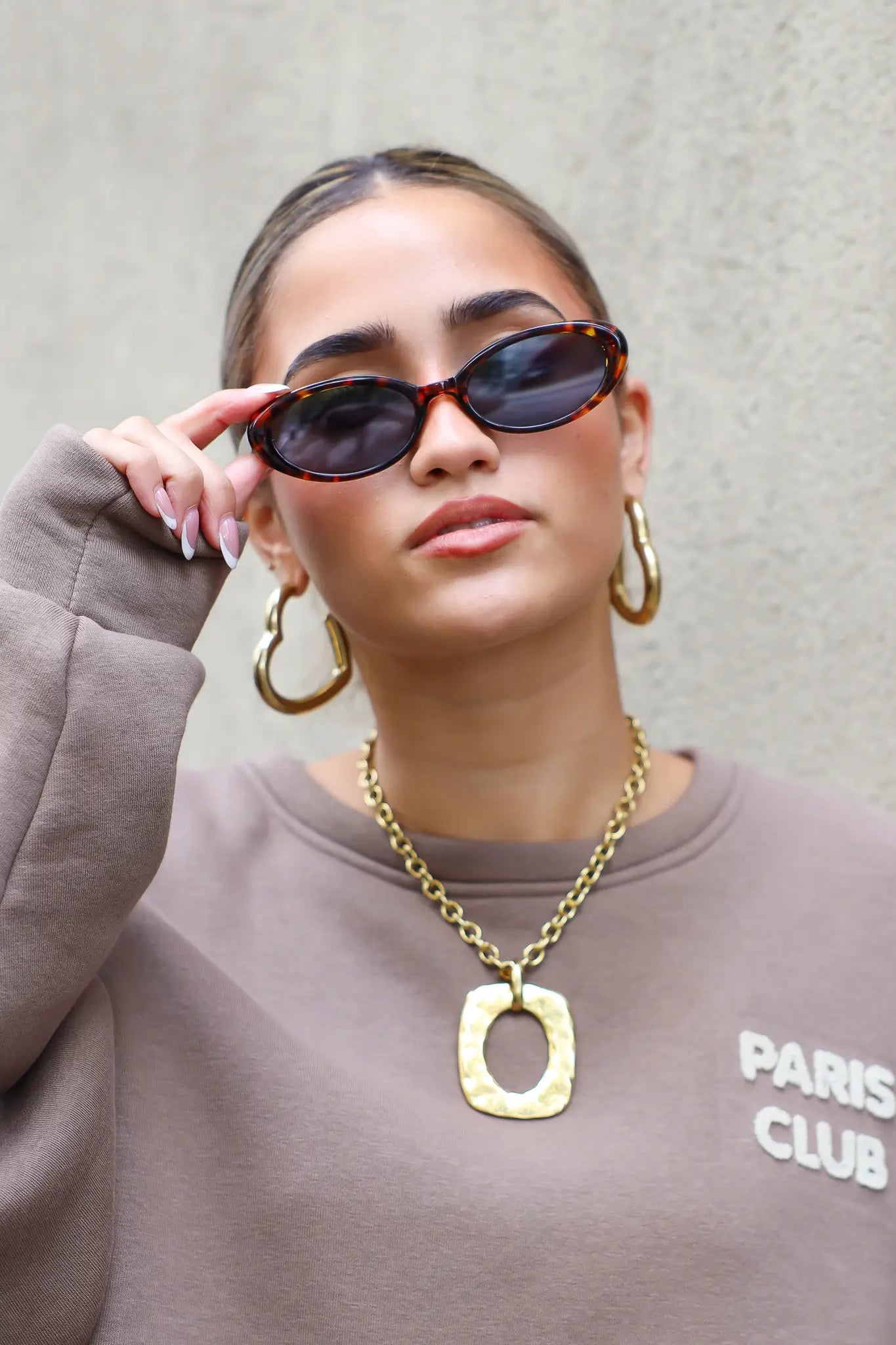 Yuna Zonnebril Bruin