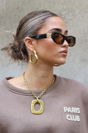 Nikki Zonnebril Zwart/Oranje