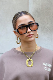 Abbey Zonnebril Zwart/Roze