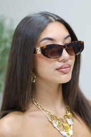 Nikki Zonnebril Bruin