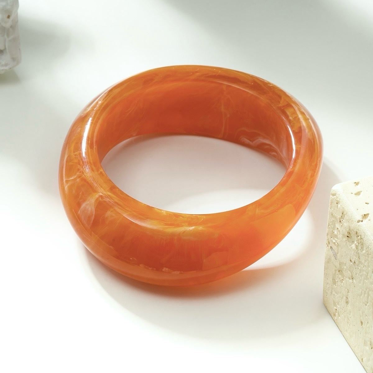 Armband plastic oranje resin dames armband