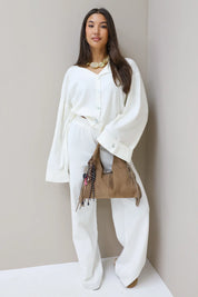 Gebreide pantalon creme elastiek taille basic lounge broek set