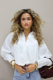 Korte ballon blouse lange mouwen wit brede manchet knoopjes dames Ladylike