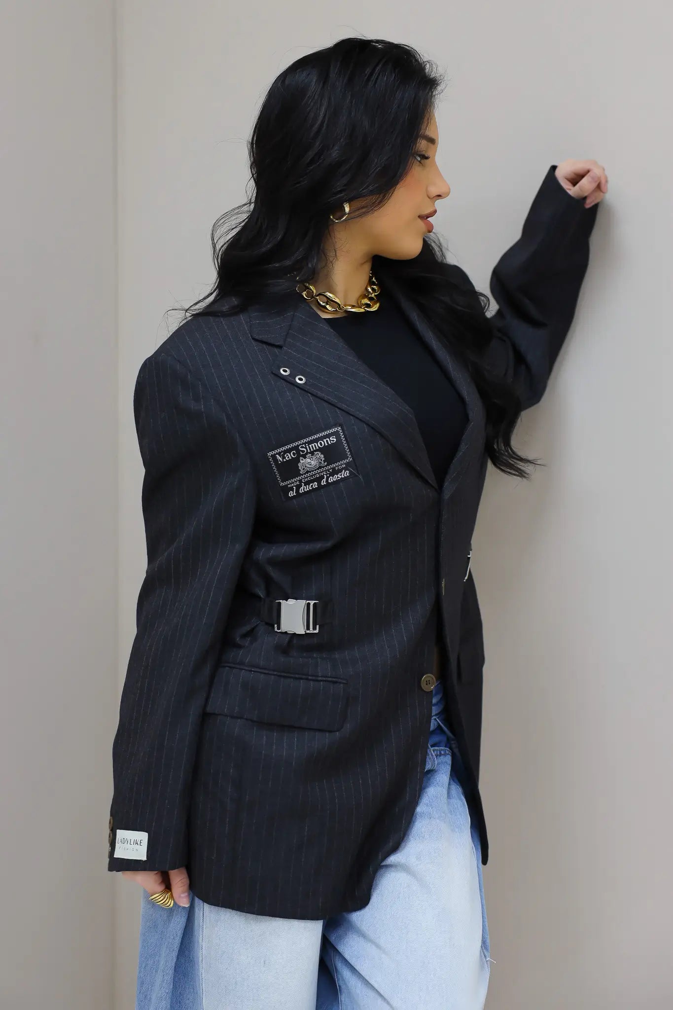 zijaanzicht van gestreepte blazer dames