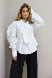 witte blouse pofmouw dames studio outfit ladylike