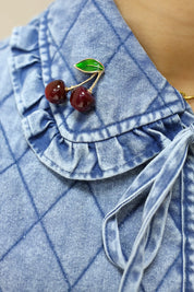 broche kersen bordeaux