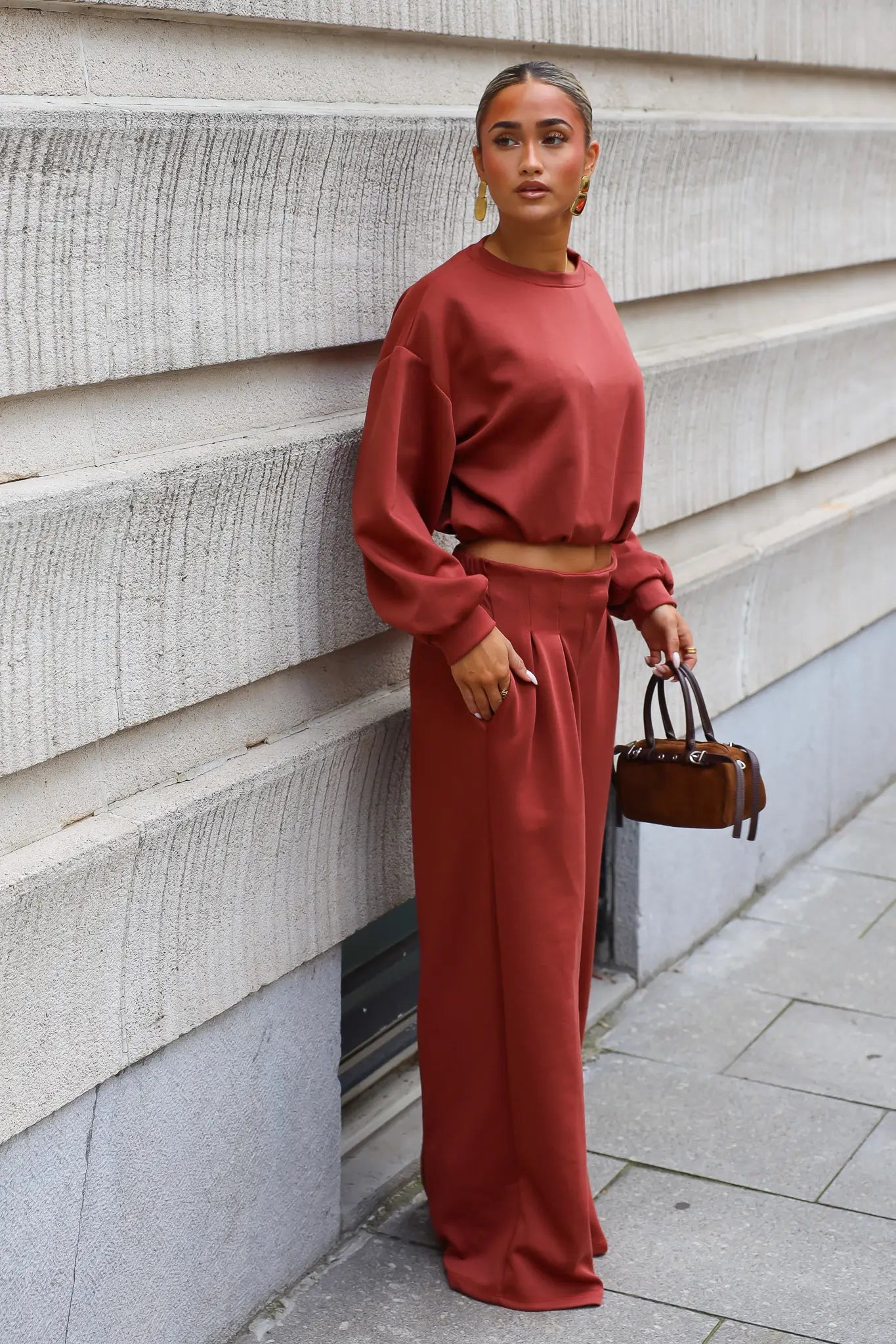 Terracotta comfy dames set met oversized sweater en hoge taille broek