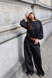 Zwarte comfy dames set met lange mouwen en losvallende wide leg broek