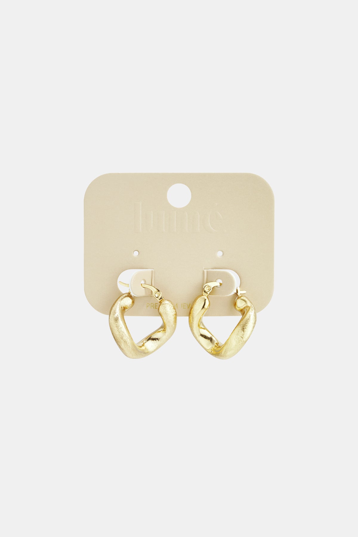 Goudkleurige creolen met ronde vorm bevestigd op kaartje