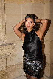 Dames halter top van glanzende stof in zwart