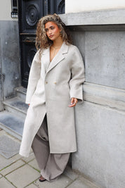 Lange beige jas met oversized fit voor dames