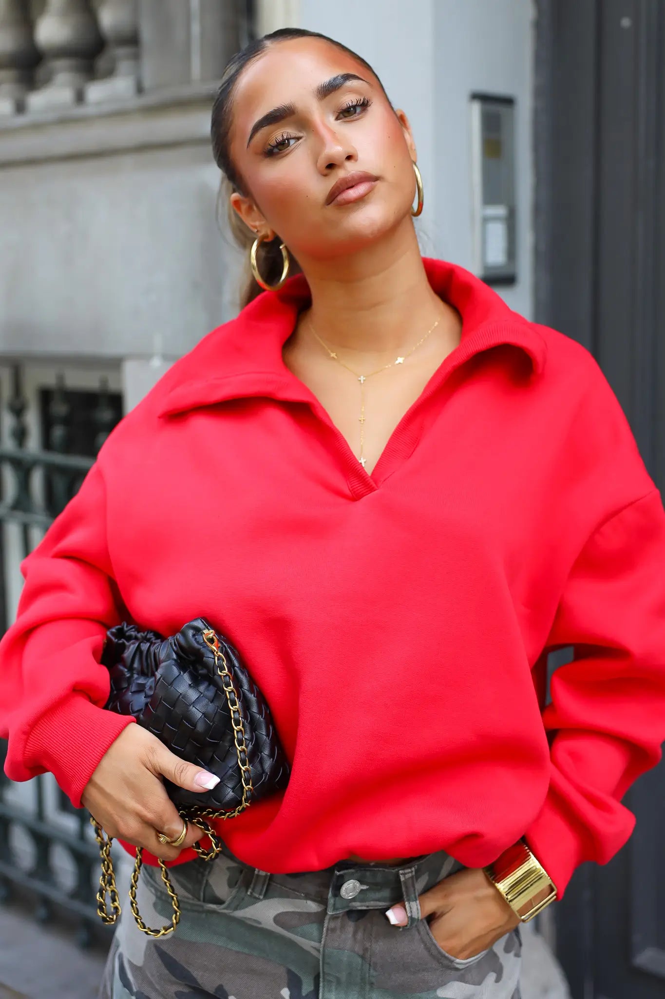 Rode polo trui dames met oversized fit