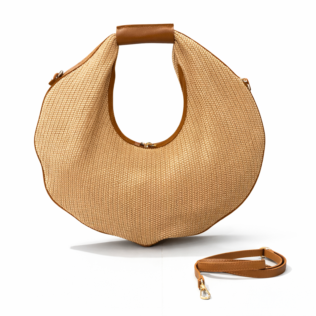 Shopper van raffia en leer bruin los gefotografeerd