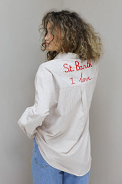 achterkant van de gestreepte beige blouse dames