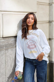T-Shirt lange mouwen wit dames gedragen met wide leg jeans