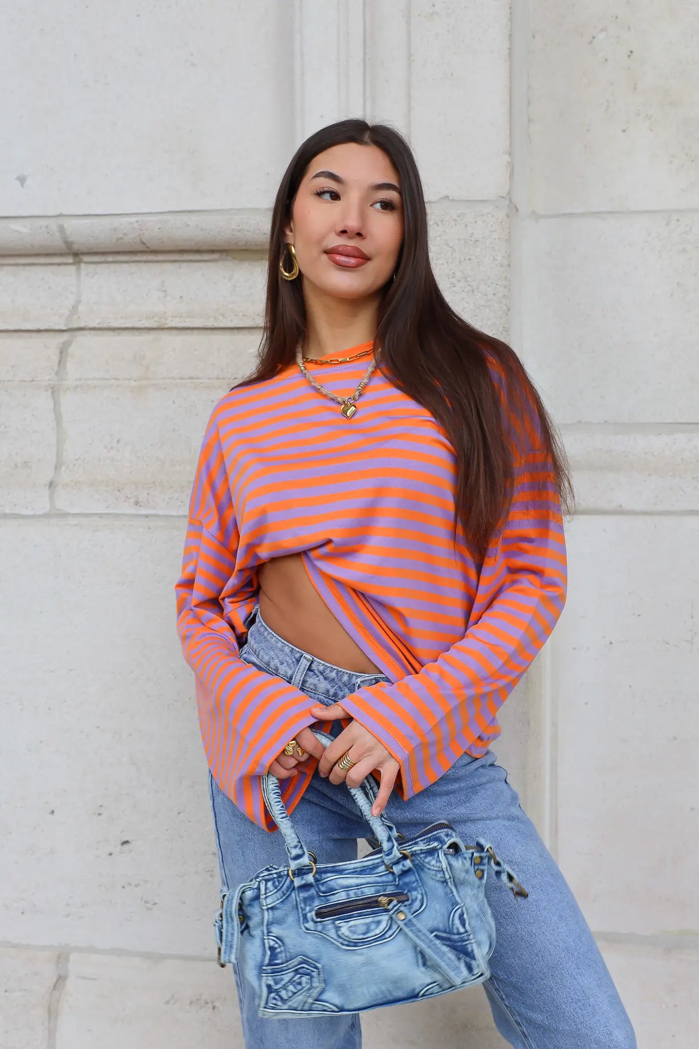 oranje gestreepte lange mouwen top dames pose ladylike