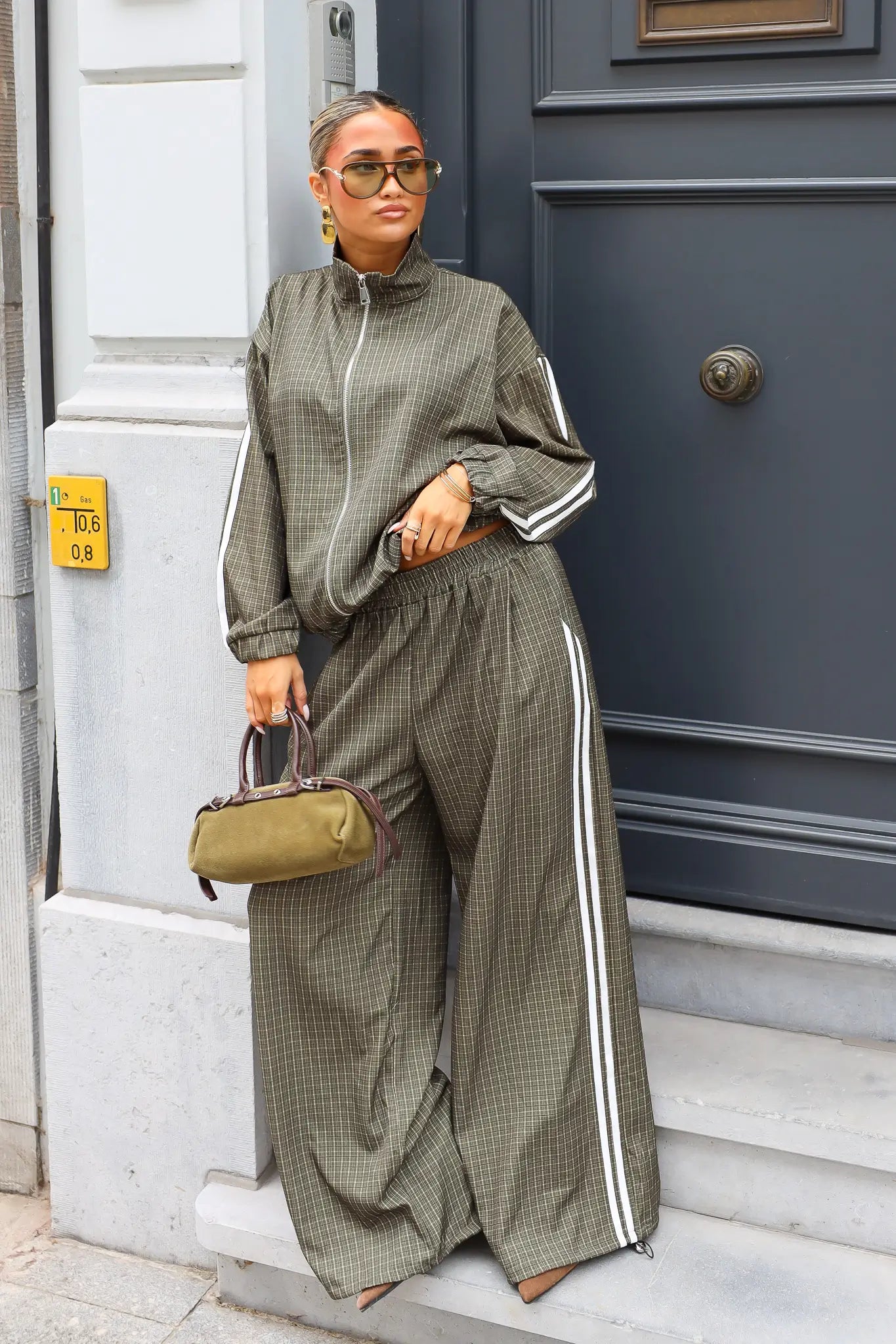 Complete olijfgroene tracksuit set met vest en wijde broek