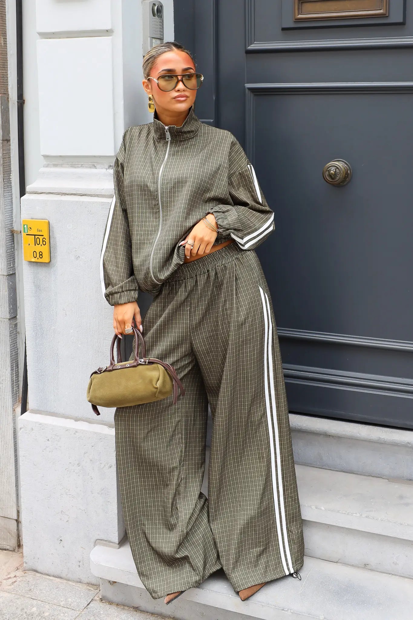 Complete olijfgroene tracksuit set met vest en wijde broek