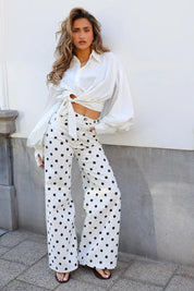 Witte polka dot jeans met wijde pijpen dames